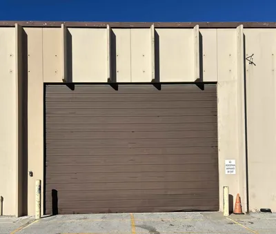 Commercial door technicians reviewing a Cold Spring, KY service plan